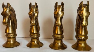 lot 339 image: Four Vintage Solid Brass Chess Knight Horse Head Figurines