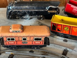 lot 513 image: Vintage Metal Toy Train Cars and Tracks