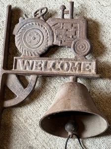 lot 22 image: Cast Iron Wall Mounted Tractor Figurine Bell
