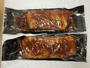 lot 75 image: A. 2x 2.20lbs St. Louis Style BBQ Pork Ribs
