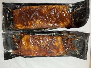 lot 76 image: A. 2x 2.20lbs St. Louis Style BBQ Pork Ribs
