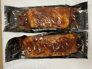 lot 78 image: A. 2x 2.20lbs St. Louis Style BBQ Pork Ribs