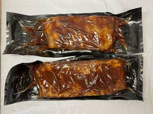 lot 79 image: A. 2x 2.20lbs St. Louis Style BBQ Pork Ribs