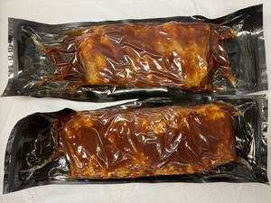 lot 80 image: A. 2x 2.20lbs St. Louis Style BBQ Pork Ribs