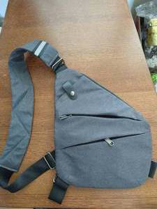 lot 26 image: New Back Saver Cross Body Travel Bag
