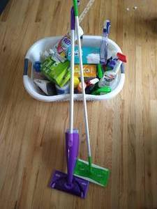 lot 41 image: Cleaning Lot - Swiffer Sweeper, Wet Jet, Dusters, Farberware Iron, And Misc. Cleaning Products
