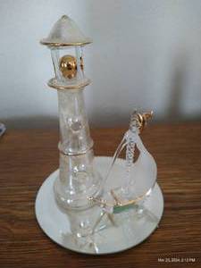 lot 88 image: UG 5 Hand-Sculpted Glass Lighthouse And Ship Figure With 22K Gold Highlights