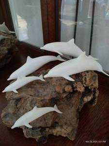 lot 100 image: John Perry Dolphins And Driftwood Sculpture