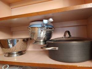 lot 178 image: Calphalon Pan, Metal And Plastic Strainers