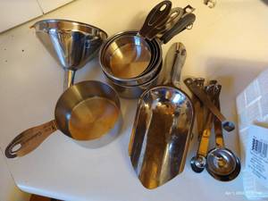 lot 192 image: Stainless Steel Measuring Cups, Measuring Spoons, And Scoop