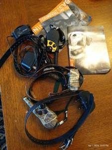 lot 225 image: 3 SportDog Training Collars, 2 Remotes, And Manual