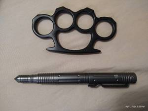 lot 295 image: Brass Knuckles And Window Breaking Pen
