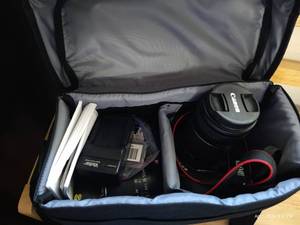 lot 304 image: Canon EOS Rebel SL1 With Batteries, Cleaning Kit, Case, Etc.