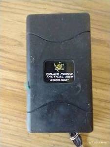 lot 337 image: Police Force Mini Tazer And Nunchucks