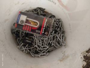lot 409 image: Bucket With Chains & Locks
