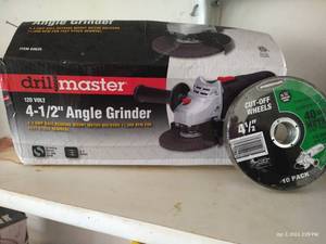 lot 421 image: New 4 12 Angle Grinder & New Blades