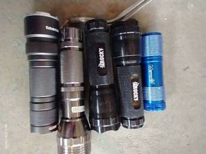 lot 465 image: Five Flashlights