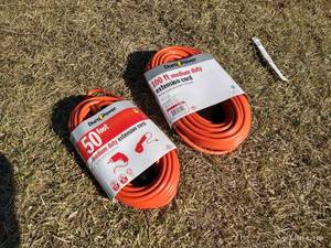 lot 594 image: 2 NEW Extension Cords - 50 And 100
