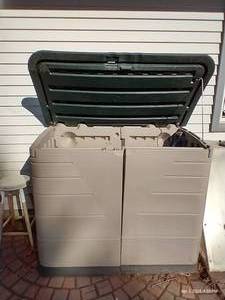 lot 620 image: Rubbermaid Outdoor Storage Bin And Contents - Flexible Hose, Tarp, Shovel, Etc. - 56 x 46 x 32