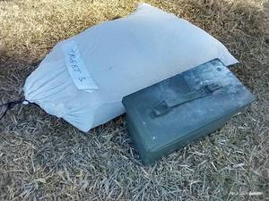 lot 623 image: Ammo Box And Bag Full Of Targets