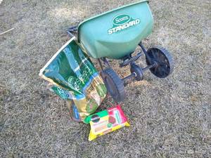 lot 631 image: Grass Seed (12 Full), Spreader, And TreeShrub Fertilizer