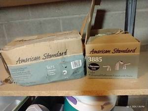 lot 681 image: NIB American Standard Faucet & Shower Parts