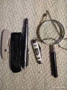 lot 743 image: (3) Pocket Knives, Emergency Tool, Magnifying Glass