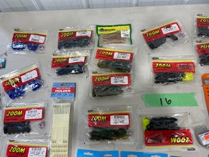 TABLE FULL OF FISHING PLASTICS