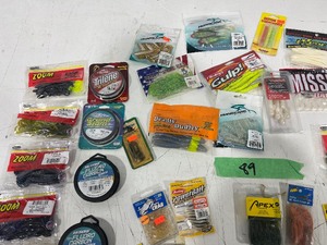 TABLE FULL OF FISHING PLASTICS