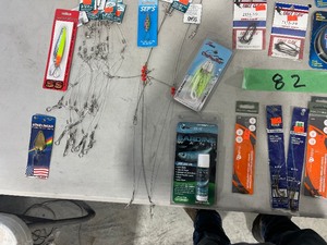 TABLE FULL OF FISHING SPOONS