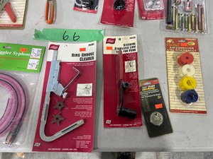 TABLE FULL OF AUTO SPECIALTY TOOLS