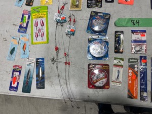 TABLE FULL OF FISHING SPOONS