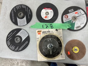 TABLE FULL OF CUT OFF WHEELS
