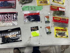 TABLE FULL OF FISHING PLASTICS