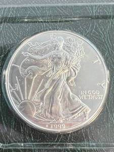 1999 AMERICAN SILVER EAGLE 1 TROY OZ .999 FINE SILVER UNC IN INFO. CASE