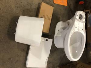 lot 7 image: Glacier Bay 2-Piece 1.28 GPF High Efficiency Single Flush Elongated Toilet in White, Seat Included (3-Pack)  Customer Returns See Pictures