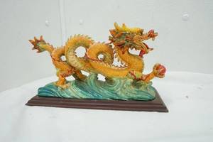 lot 4 image: Dragon Decor Orange and Yellow Dragon Statue