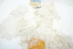 lot 52 image: Variety of shapes and sizes of Doilies