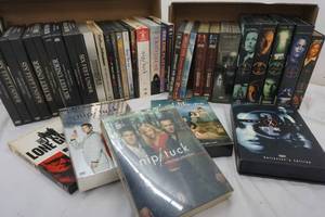 lot 93 image: Variety of DVDs, X Files Series, Six Feet Under Series, Niptuck series new, used and more