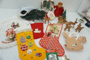 lot 241 image: Variety of Christmas Decor, Lights, Wooden Reindeer, Stockings, Christmas heart, Santa Face and more