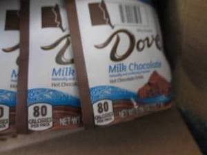 lot 104 image: Case of 72 pks Dove Milk Chocolate ...