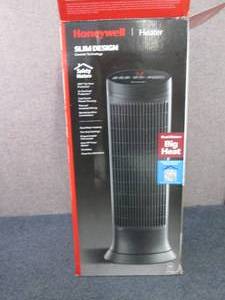 lot 113 image: Honeywell Slim Design Heater open b...