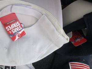 lot 169 image: 4- US Flag Caps, 3 USA Caps...