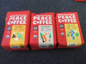 lot 436 image: 3- 12 oz Assorted Peace Ground Coff...