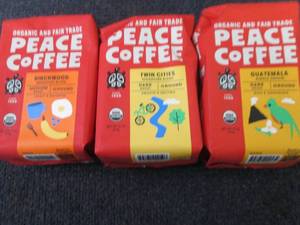 lot 438 image: 3- 12 oz Assorted Peace Ground Coff...