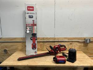 lot 76 image: TORO Flex-Force 60-volt Max 24-in Battery Hedge Trimmer 2.5 Ah (Battery and Charger Included)