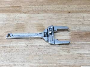 lot 82 image: Husky Adjustable Plumbers Wrench 10 255mm