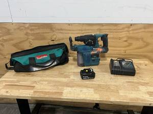 lot 165 image: MAKITA Hammer Drill with HEPA Filter, Battery and Charger