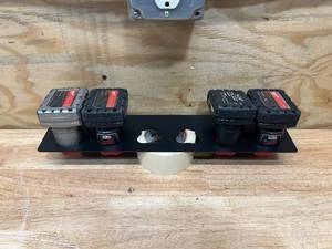 lot 163 image: MILWAUKEE M12 Battery Holder (batteries not included)