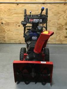 lot 1A image: Toro  24 in. (61 cm) Power Max e24 60V Two-Stage Snow Blower Model # 39924 (retail $1899)